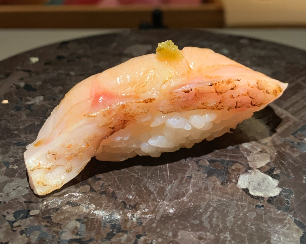 Set of 4 sushi isolated on white. Salmon - Sake, Eel - Unagi